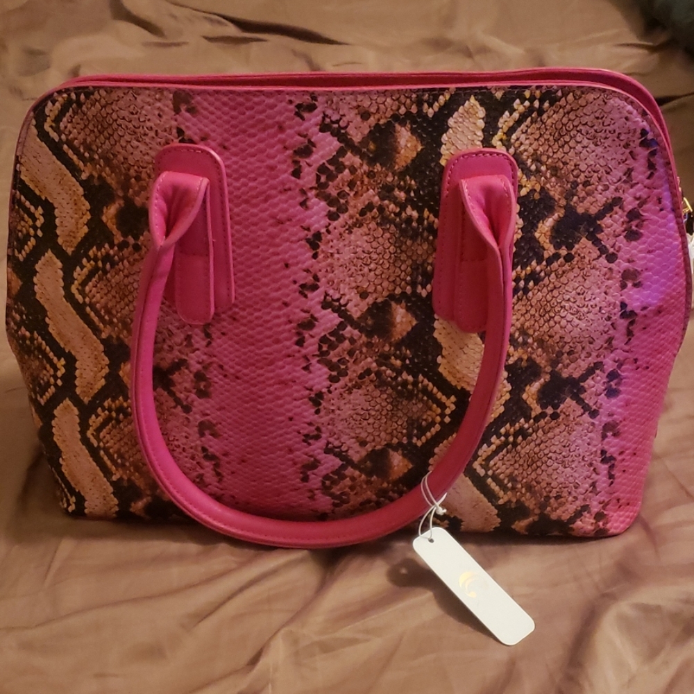 Pink Charming Charlie snakeskin purse